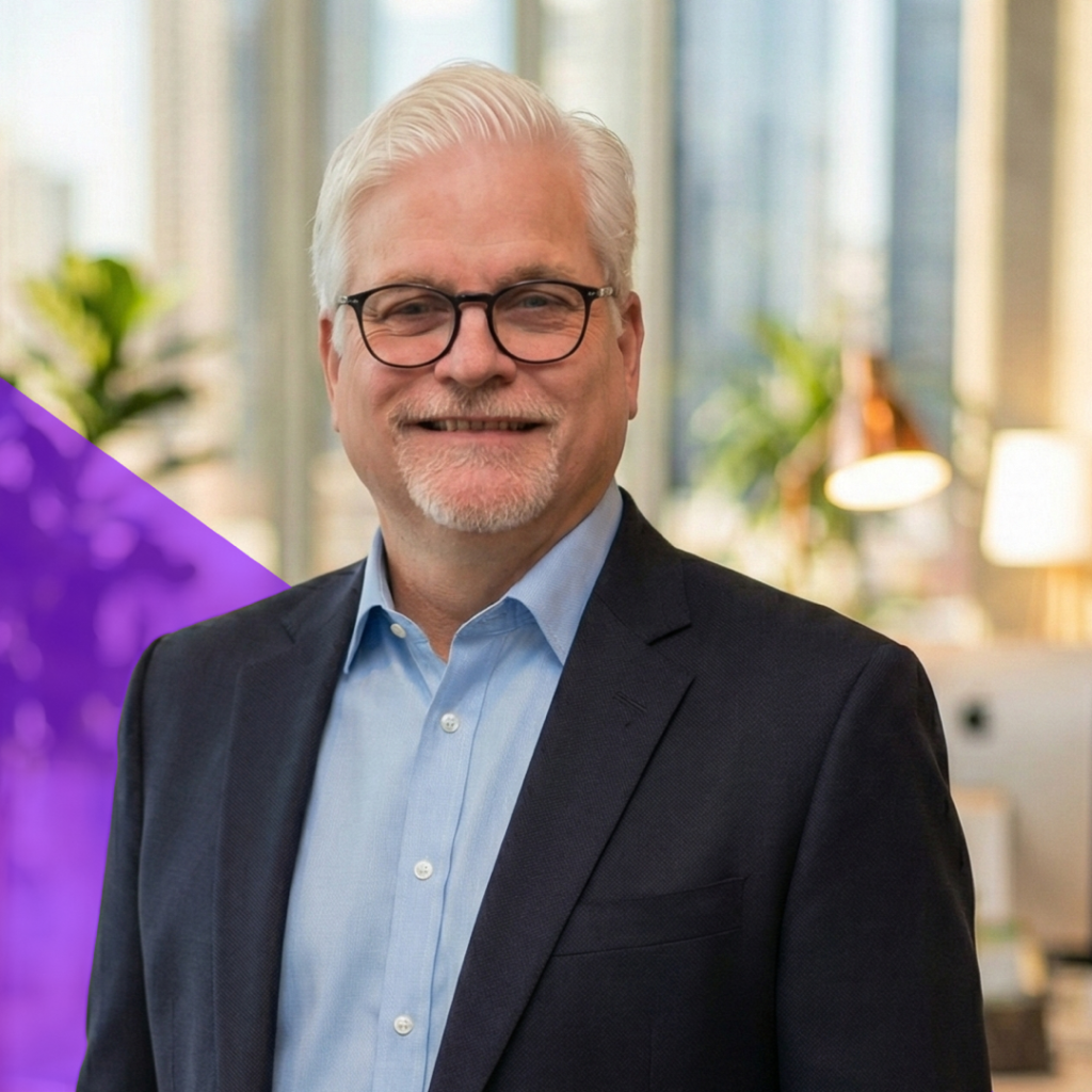 Douglas vanden Bosch, Chief Executive Officer of Total Service, smiling in a professional setting, emphasizing leadership in AI-enabled elevator service software.