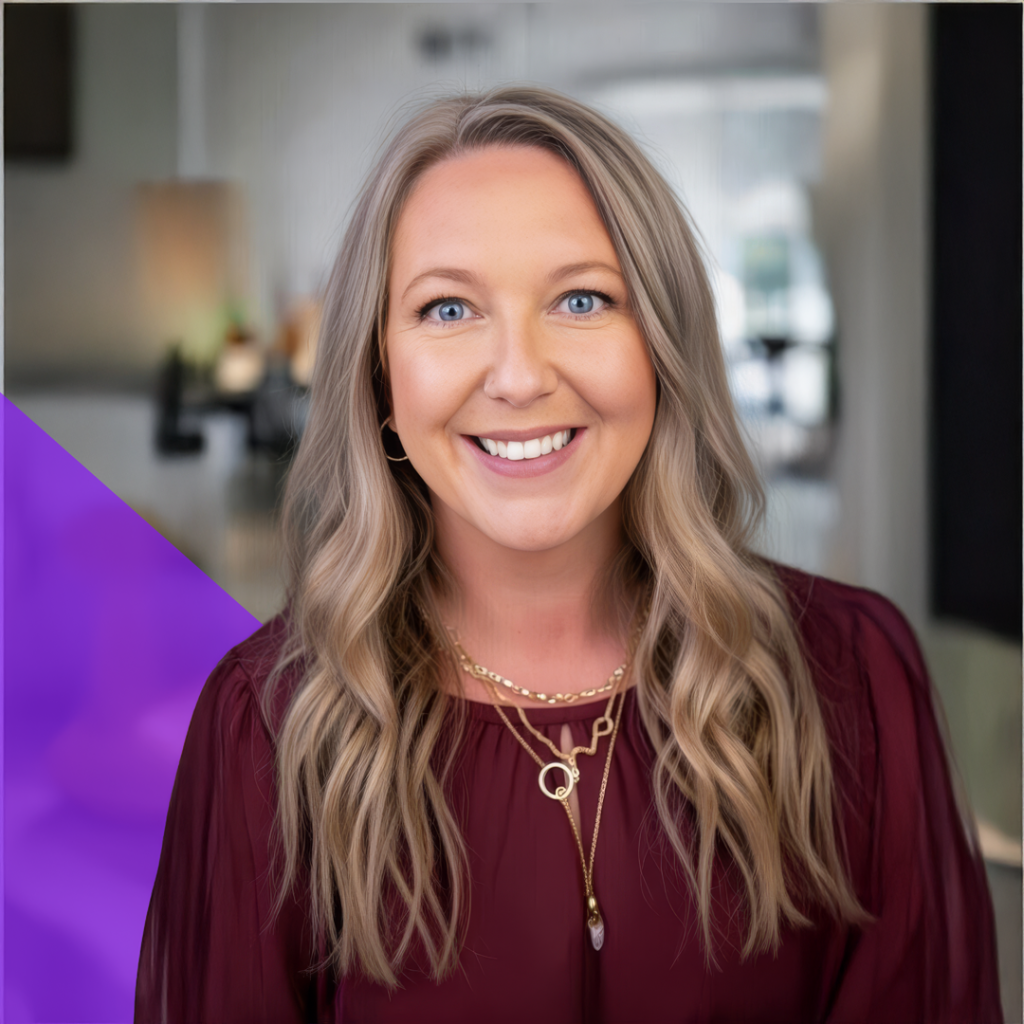 Stephanie DeHart, Software Consultant and Implementation Specialist at Total Service, smiling in a professional setting, wearing a burgundy top and layered necklaces, with a blurred office background.